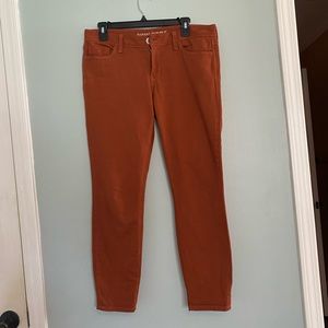 Orange skinny jeans